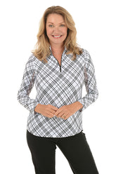 Woman wearing a black and white checkered shirt on a white background.