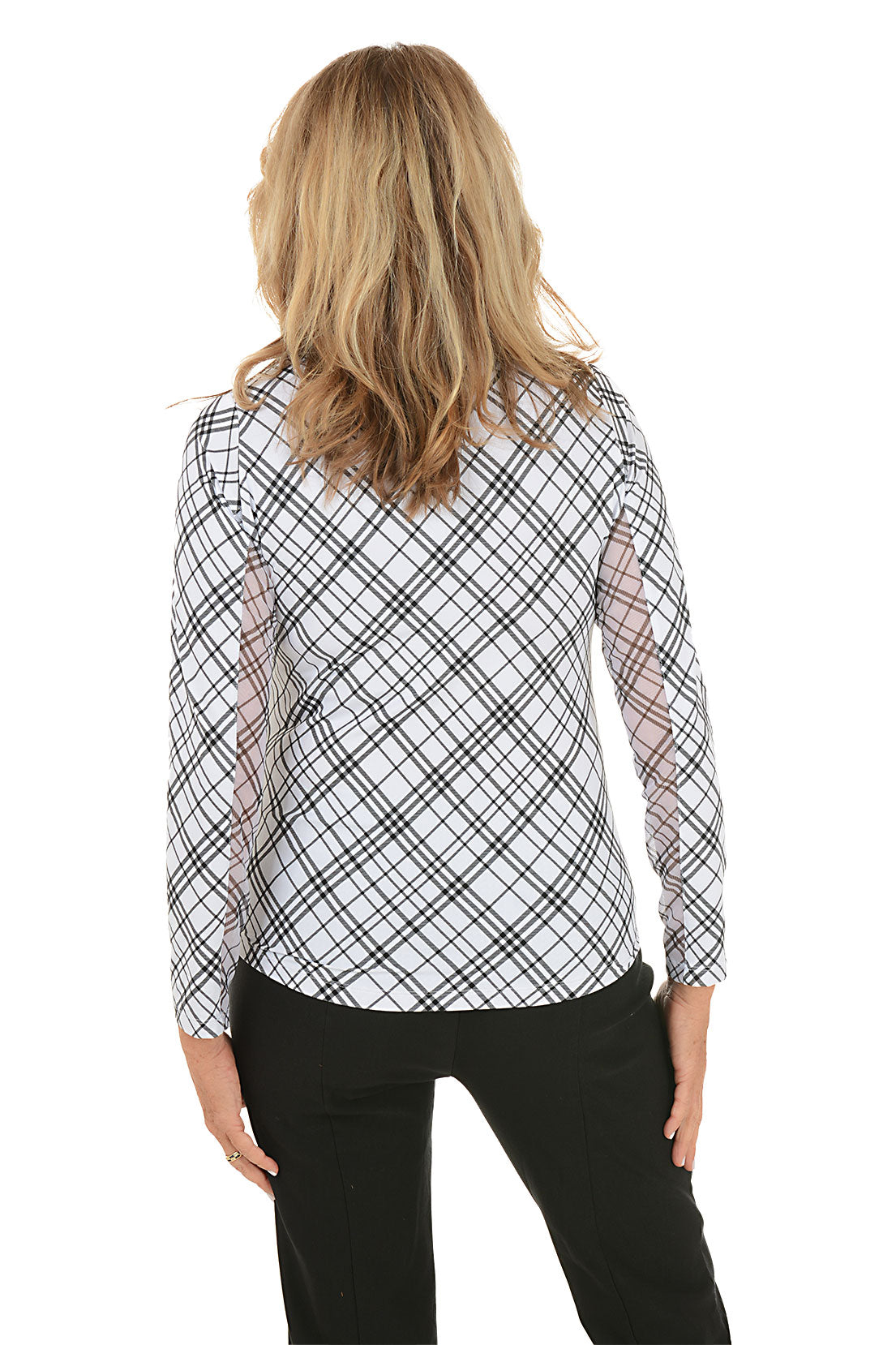 Woman wearing a black and white checkered shirt on a white background. Back shot.