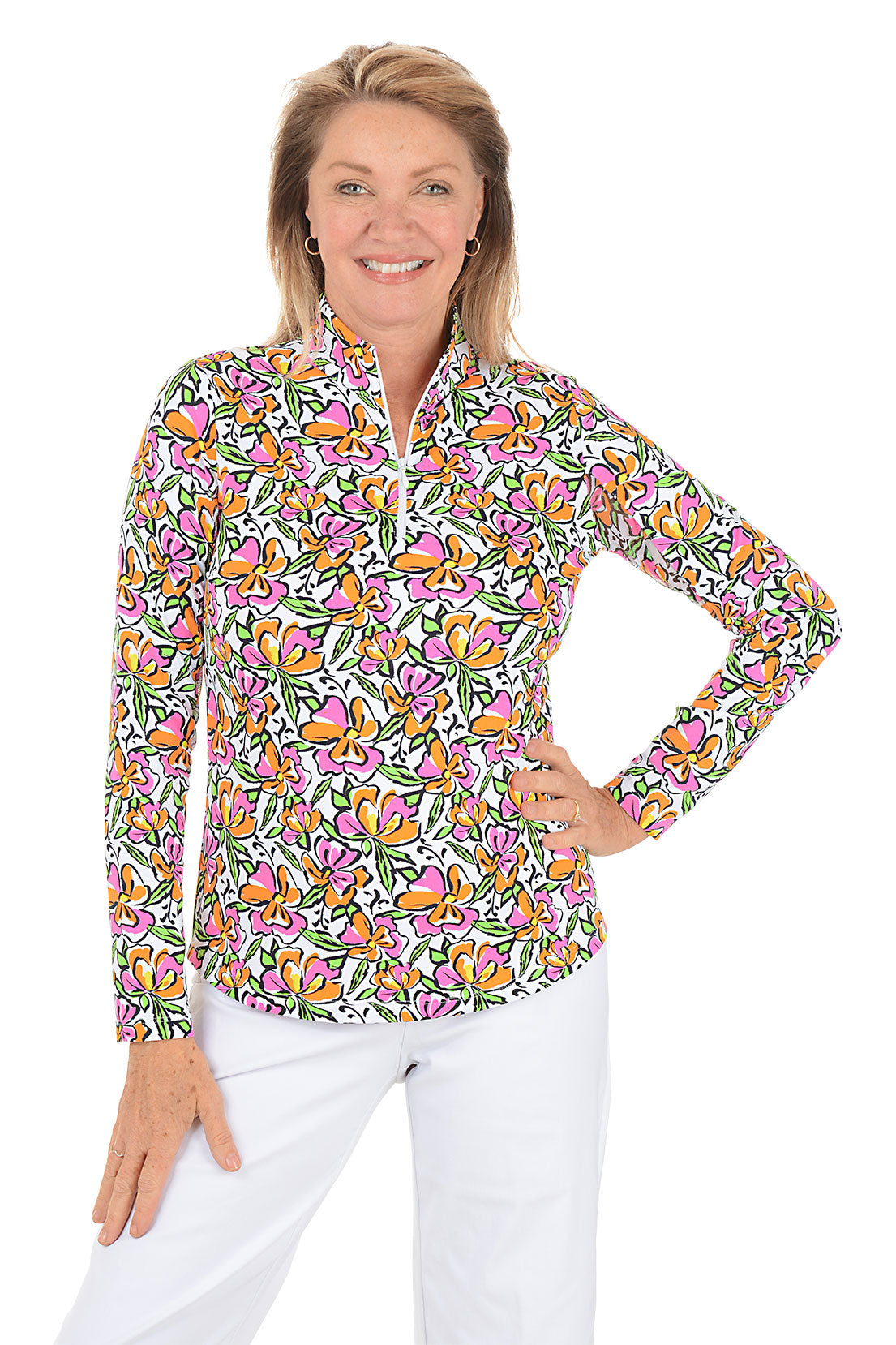 Woman wearing a colorful floral patterned shirt on a white background.