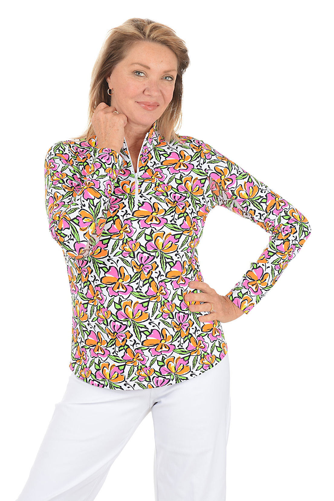 Woman wearing a colorful floral patterned shirt on a white background. Second front shot.