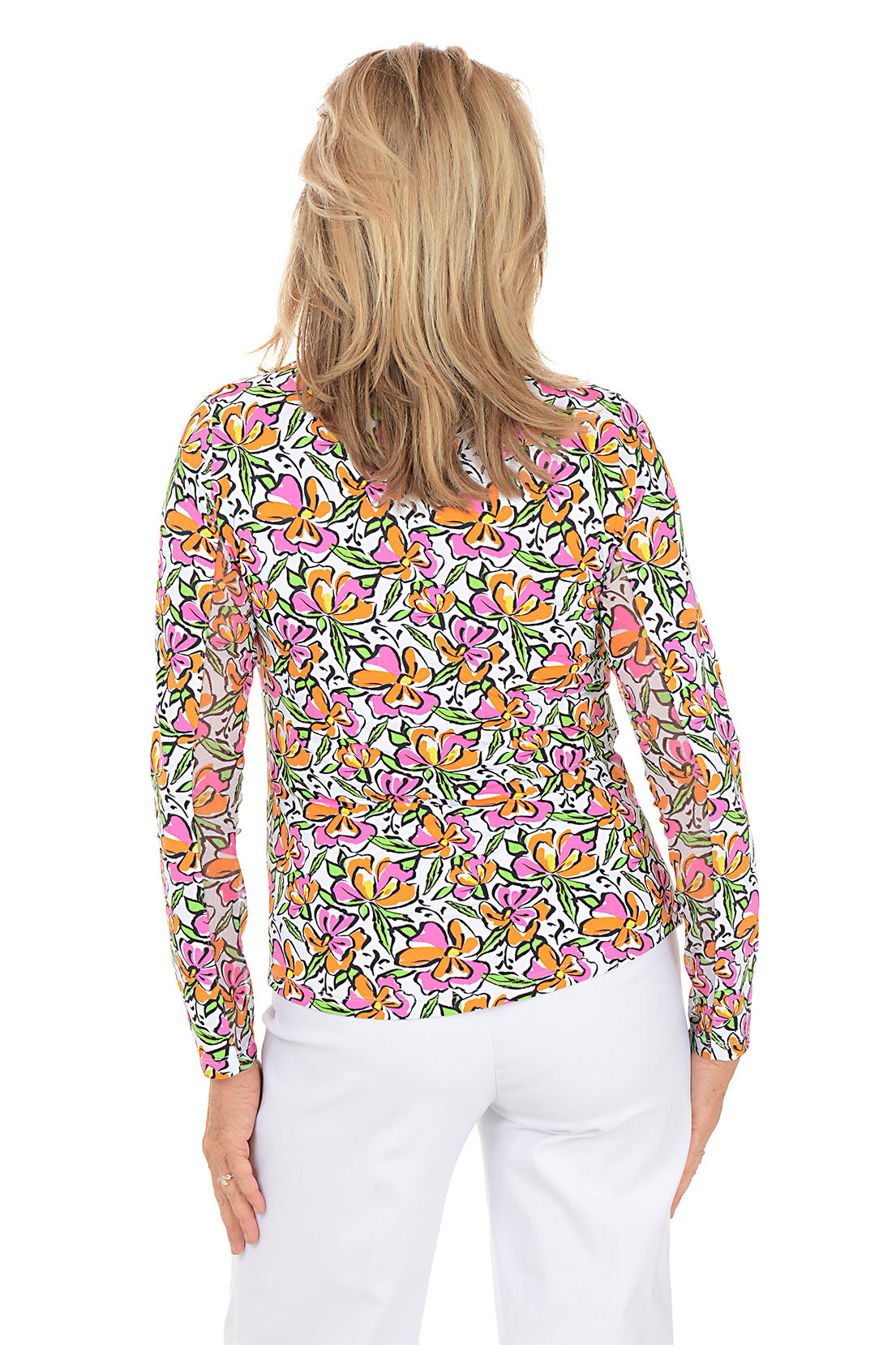 Woman wearing a colorful floral patterned shirt on a white background. Back shot.