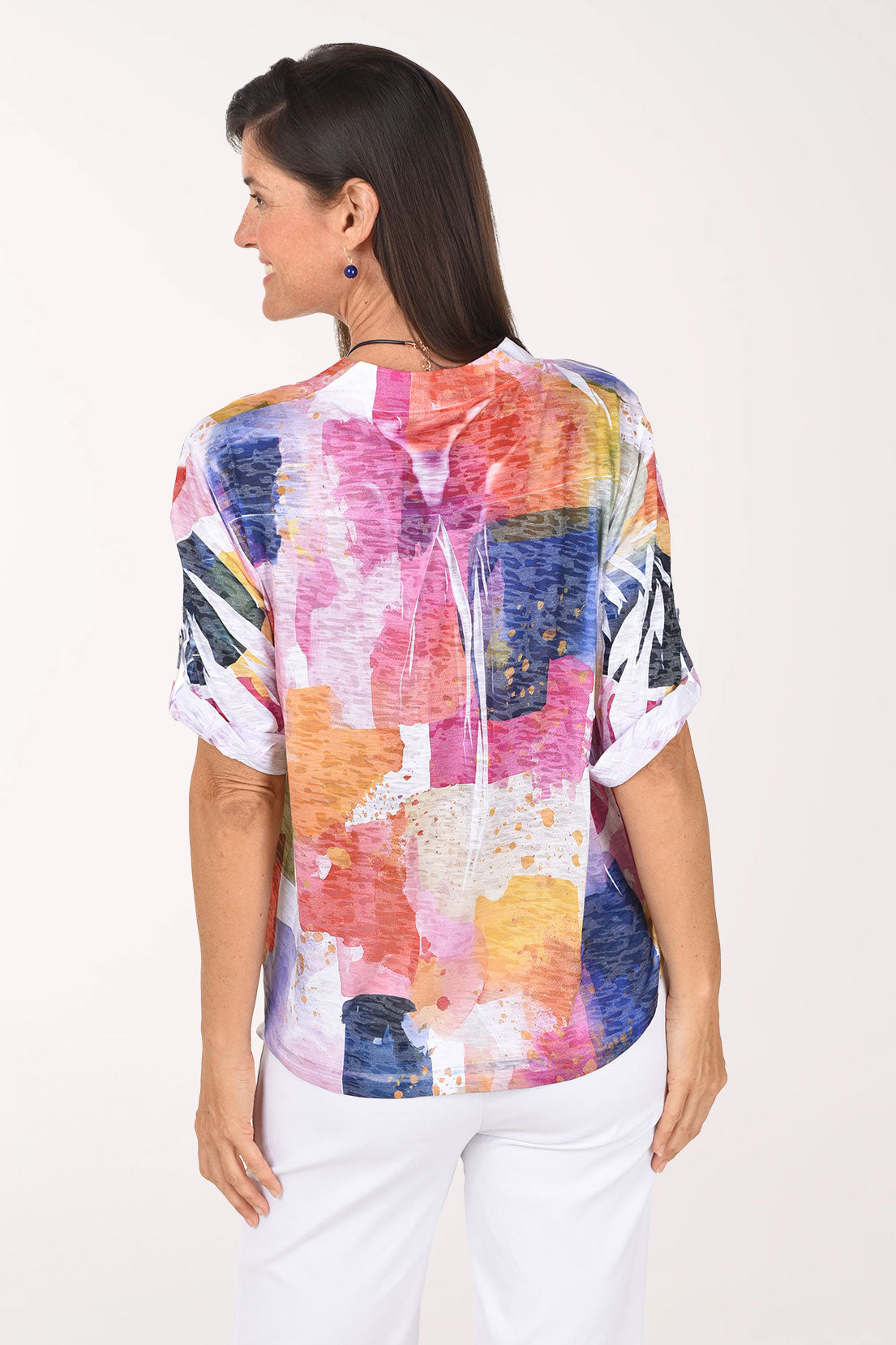Back view of the Prism Blocks High-Low Knit Top in watercolor color blocks