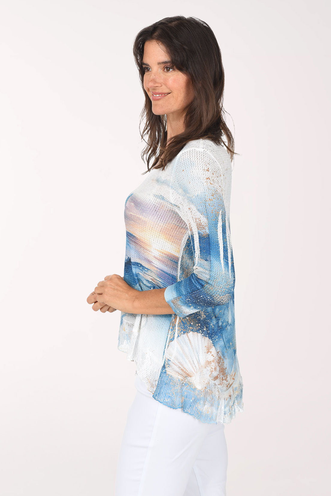 Side view showing the high-low mesh hem with seashells near the hem