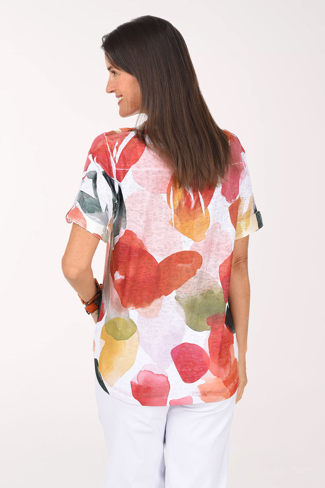 Back view of the Drifting Petals Sequin Accented Polo Top with the center back pleat