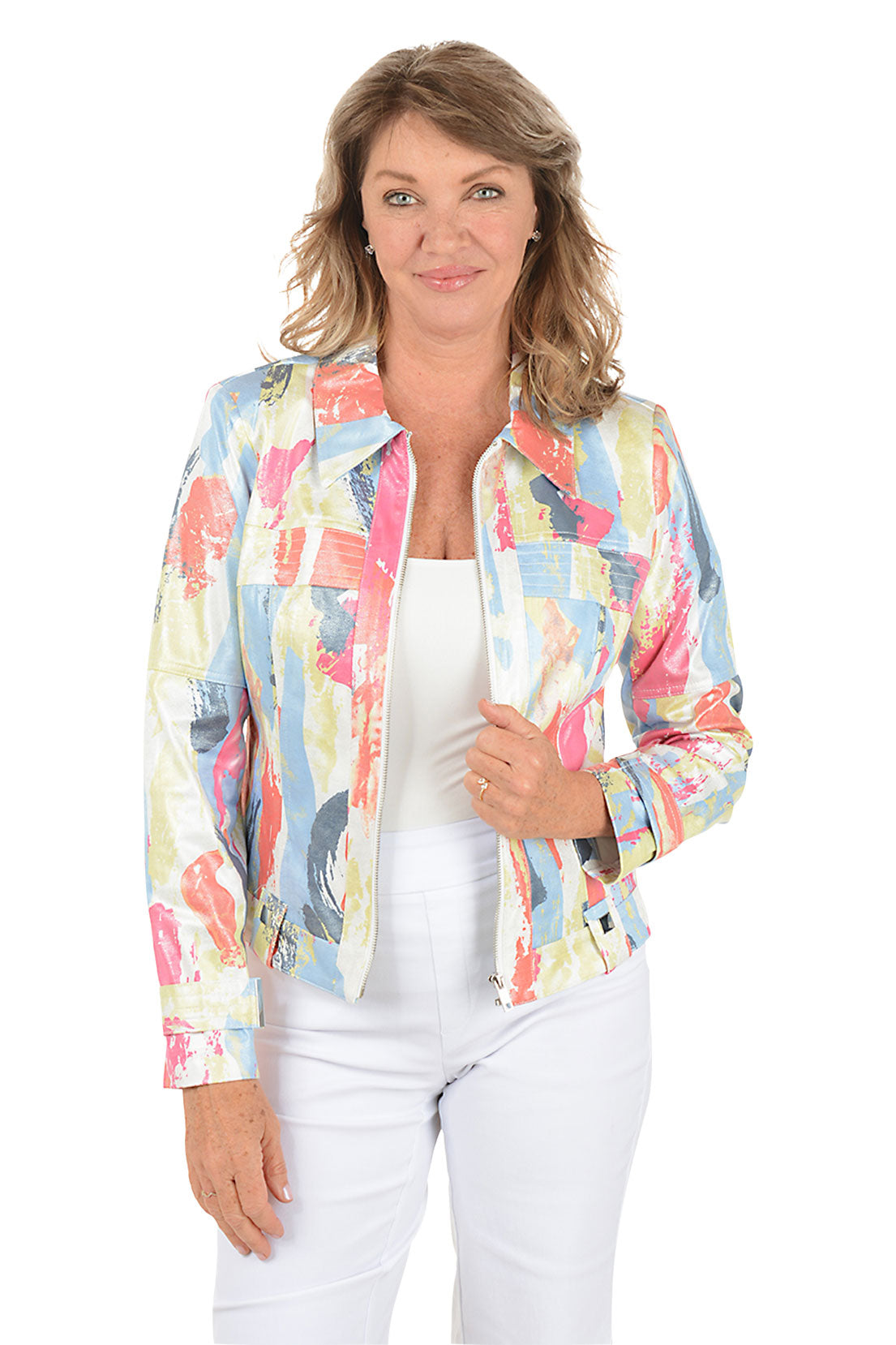 Woman wearing a colorful jacket over a white shirt and pants on a white background.