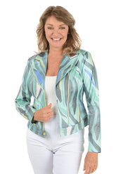 Woman wearing a colorful jacket with abstract patterns on a white background.