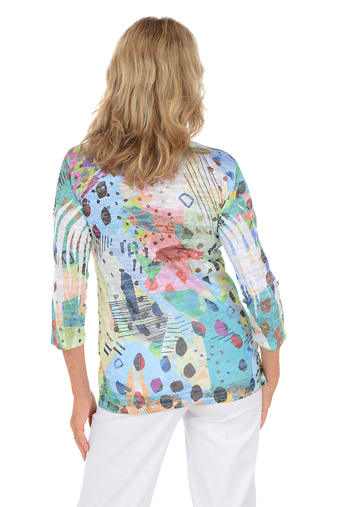 A woman wearing a 3/4 sleeve multicolored top with an abstract pattern. Back shot.