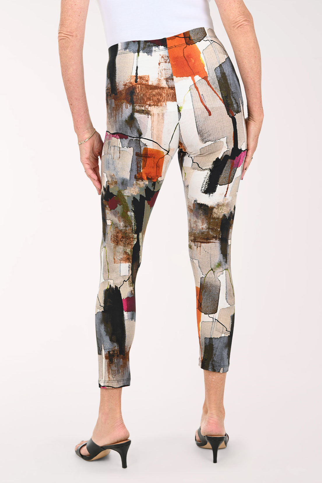 Woman wearing abstract printed leggings