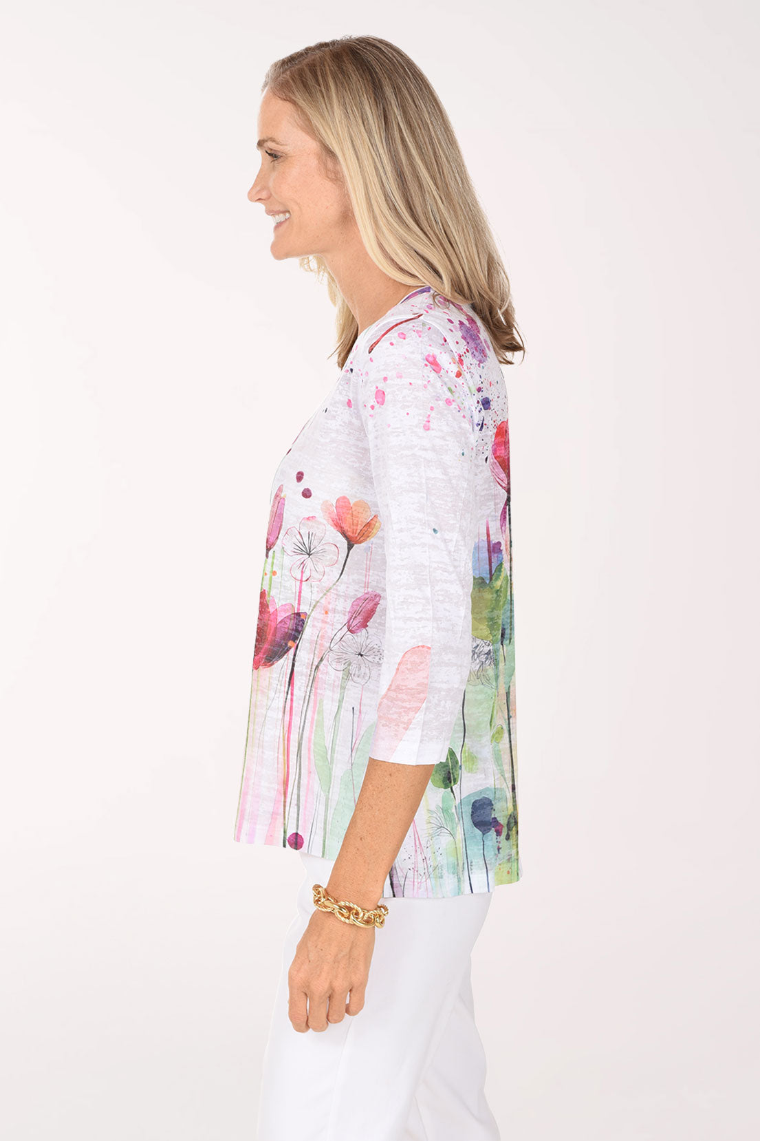 Side view of the Primavera Burnout High-Low Knit Top showing the high-low hem