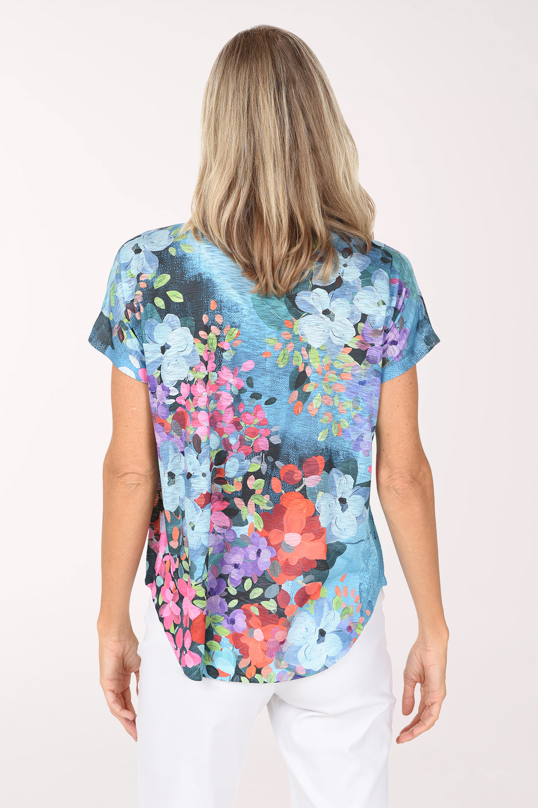 Back view of the Petunia Slub Knit Short Sleeve Top in blue floral