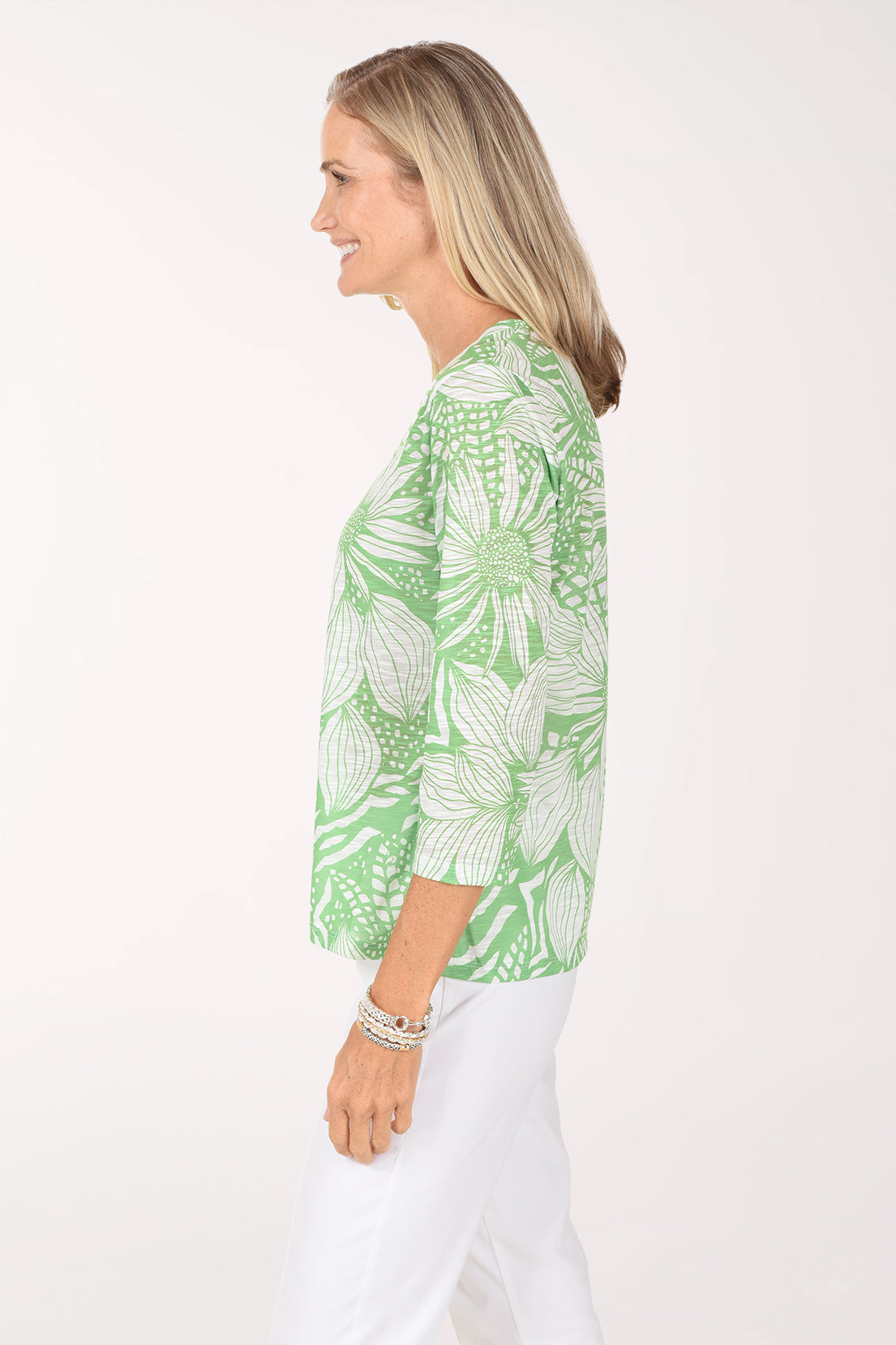 Side view of the Block Lightweight V-Neck Top with 3/4-length sleeves and side slit