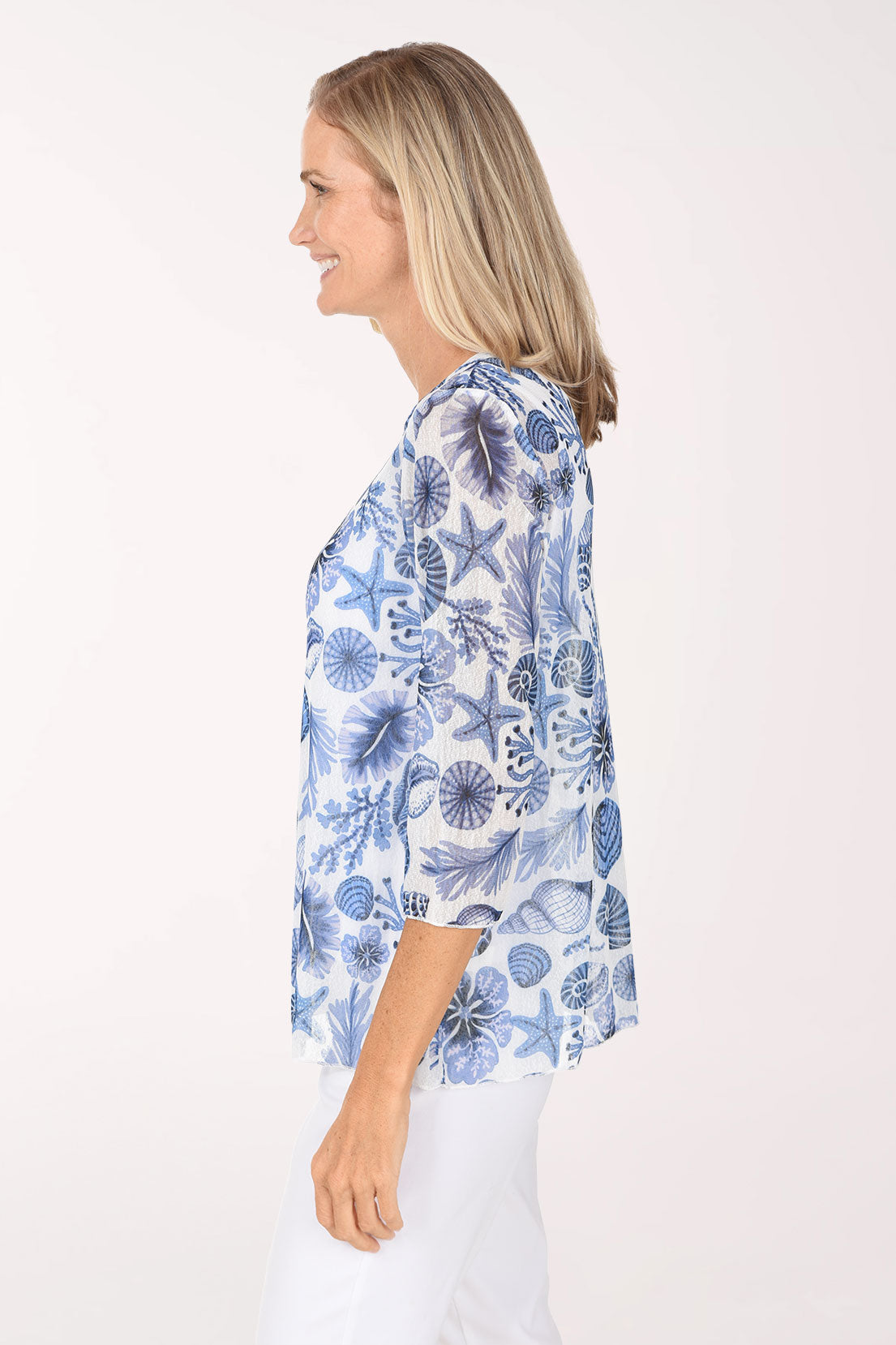 Side view of the Sally Mesh 3/4 Sleeve Top showing the 3/4-length sleeves