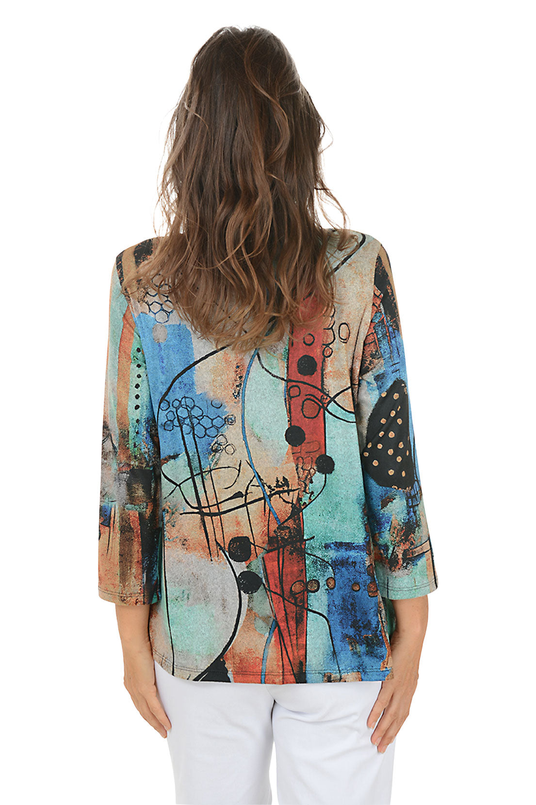 Woman wearing a colorful patterned top on a white background. Back shot.
