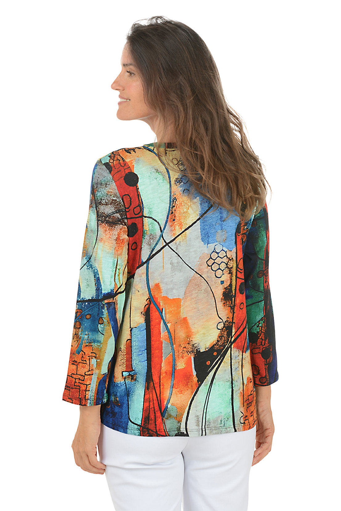 Woman wearing a colorful abstract patterned top on a white background. Back shot.