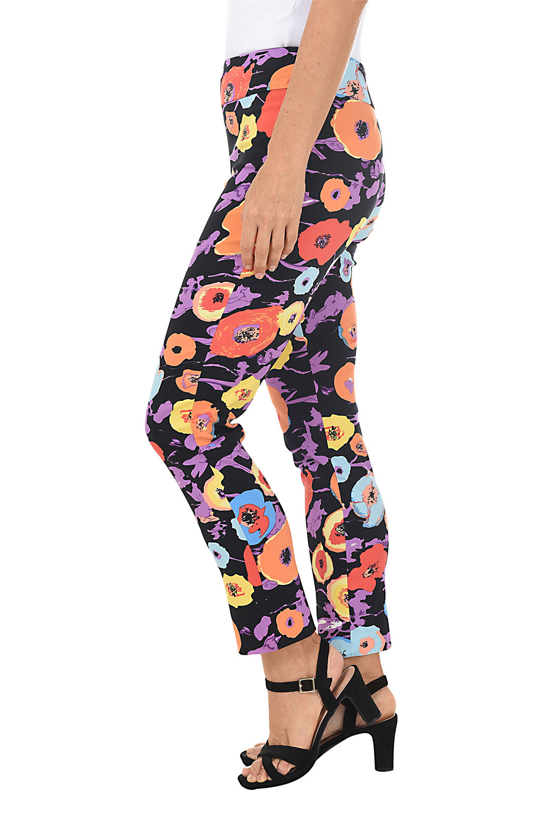 Side shot of model in black multi colored floral pants