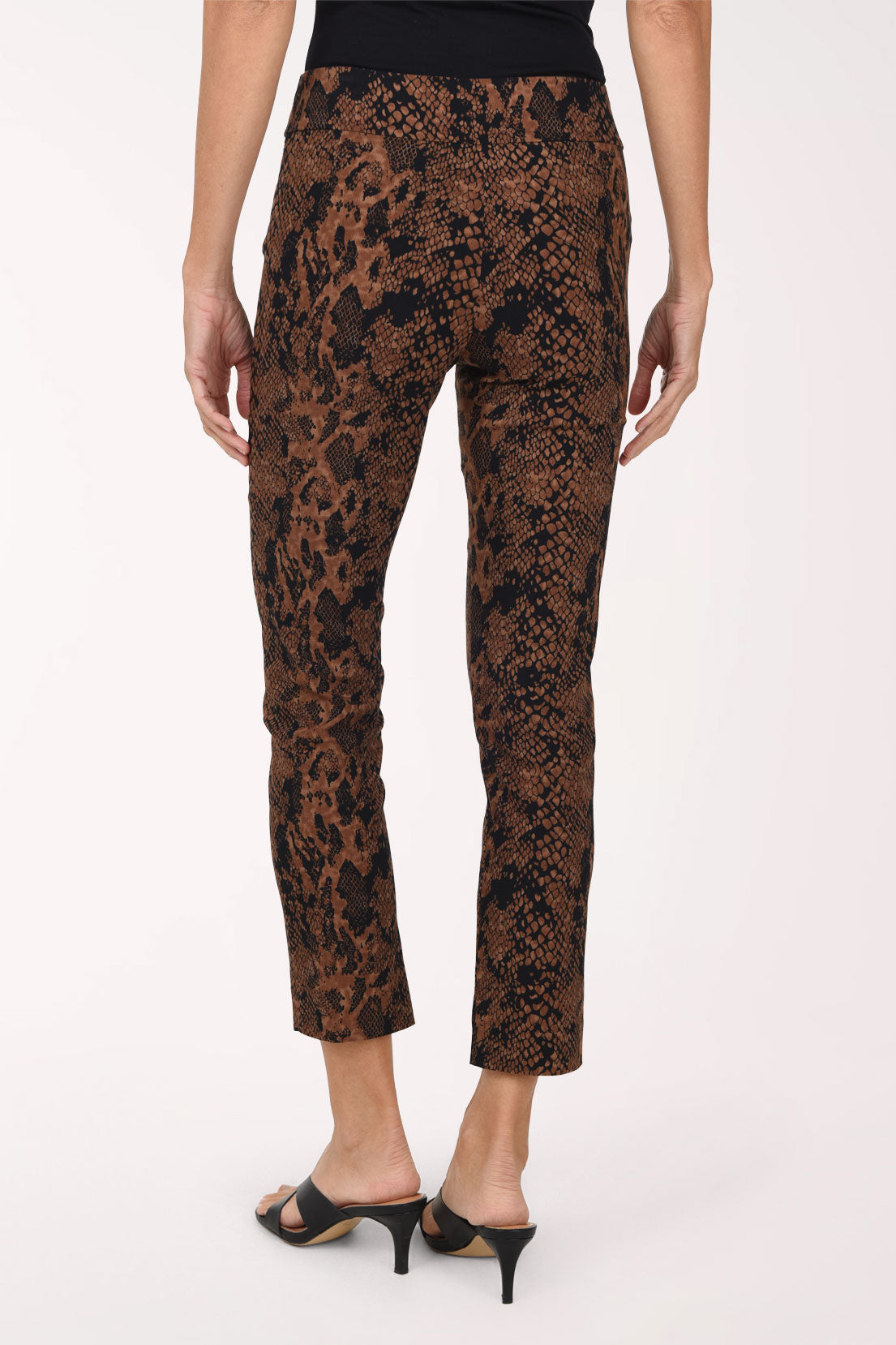 Women wearing brown python printed pull-on ankle pants