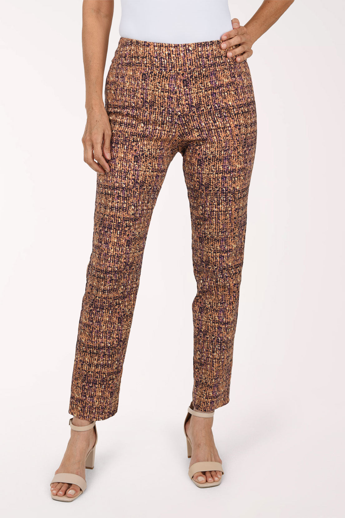 Women wearing a cashew brown pull-on ankle pant