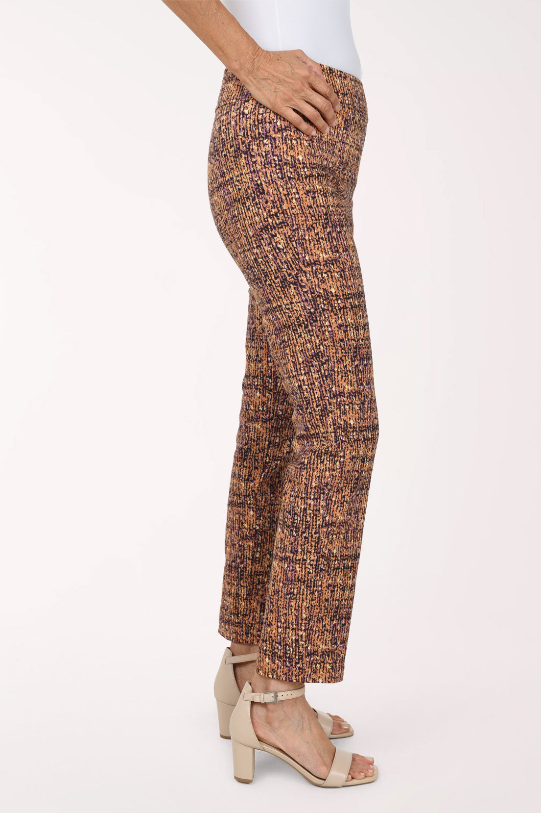 Women wearing a cashew brown pull-on ankle pant