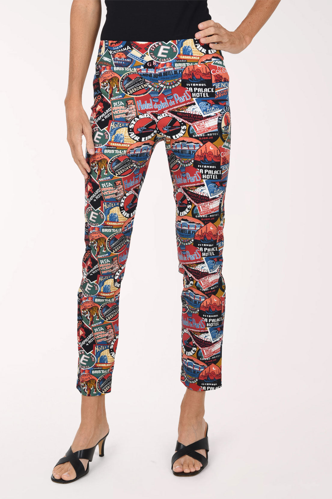 Women wearing an assorted passport print pull-on ankle pants
