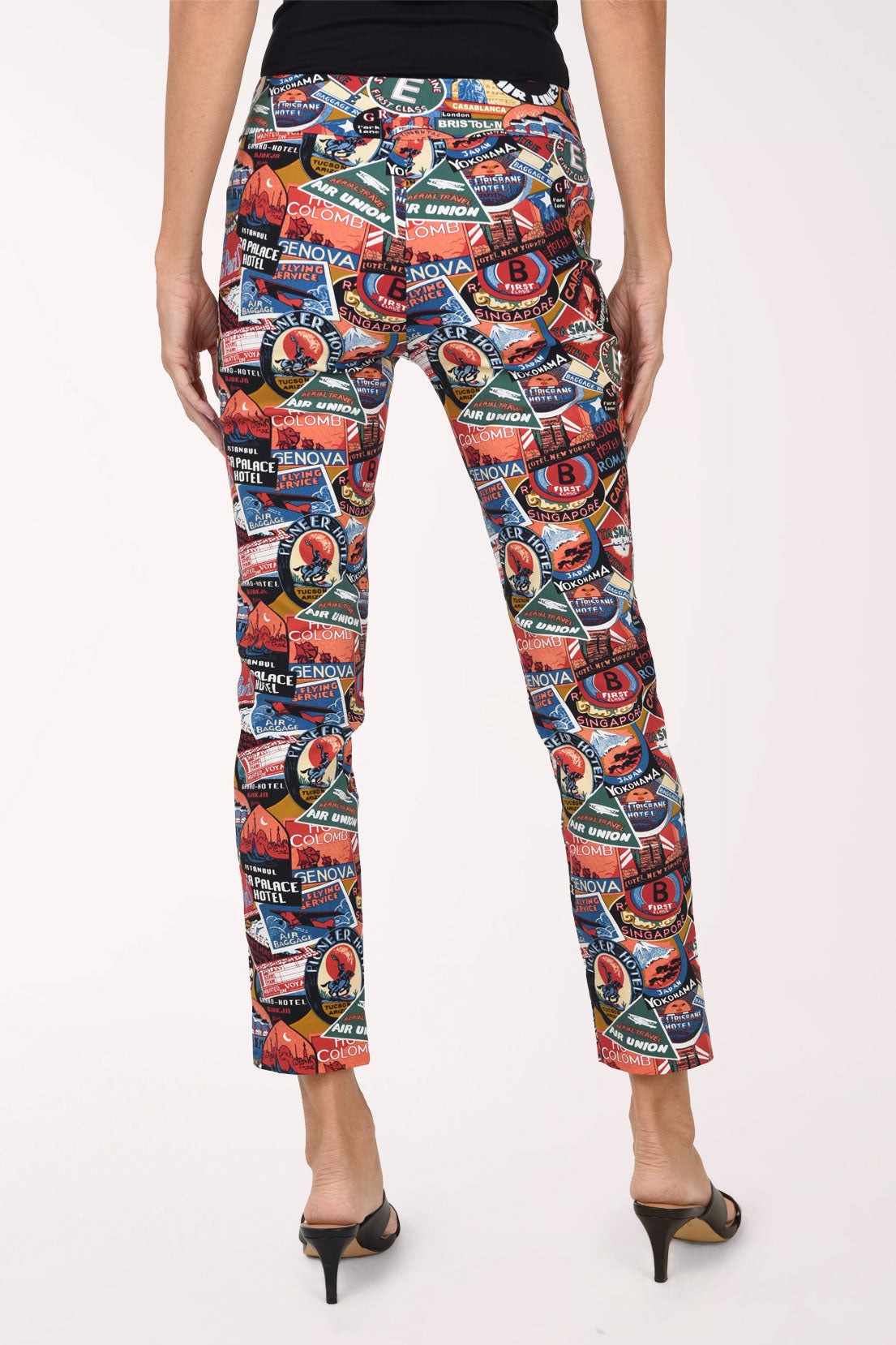 Women wearing an assorted passport print pull-on ankle pants