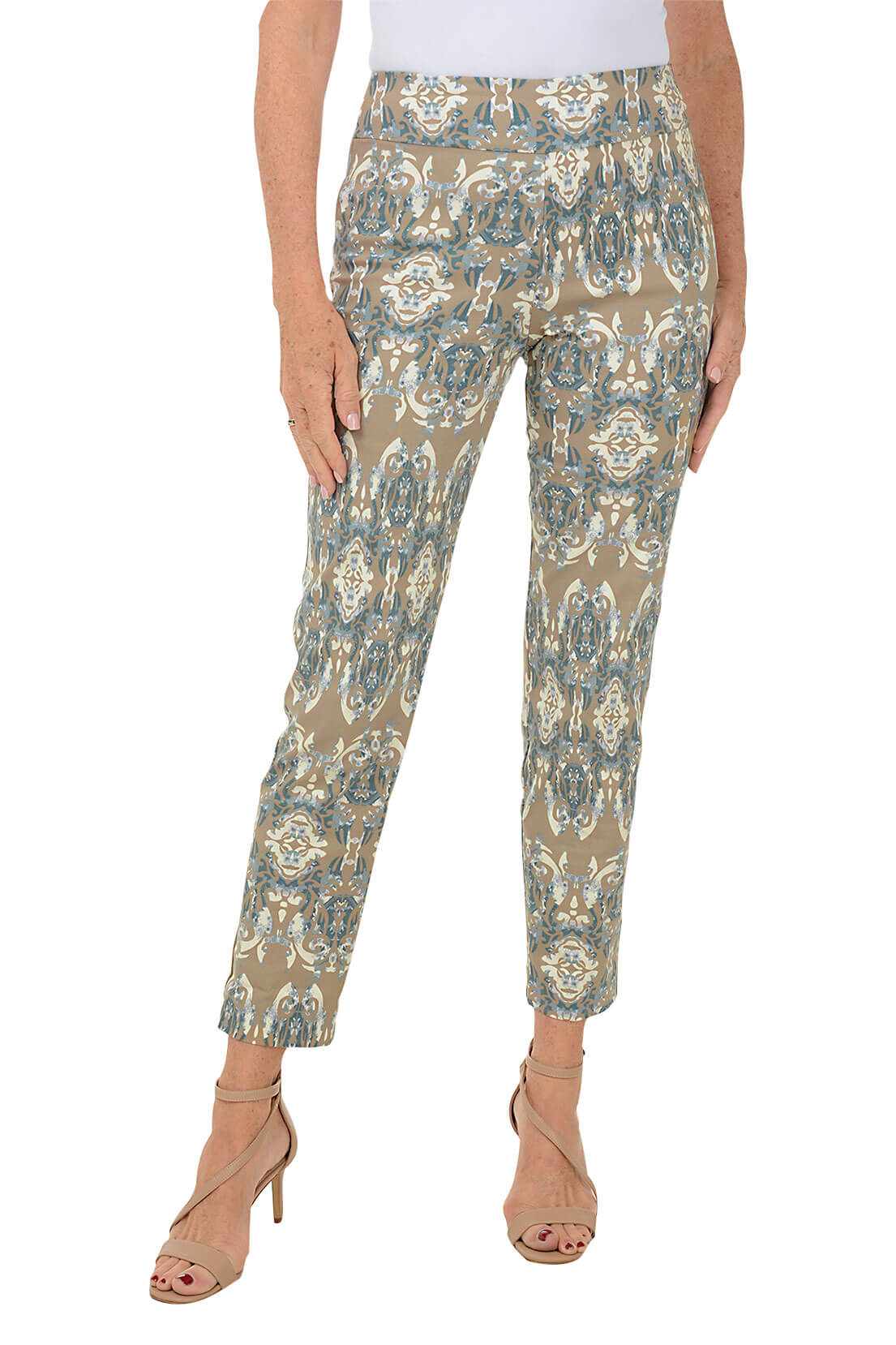 A front shot of a model wearing a pair of pull-on ankle pants with an elasticized waistband and a damask mosaic print.