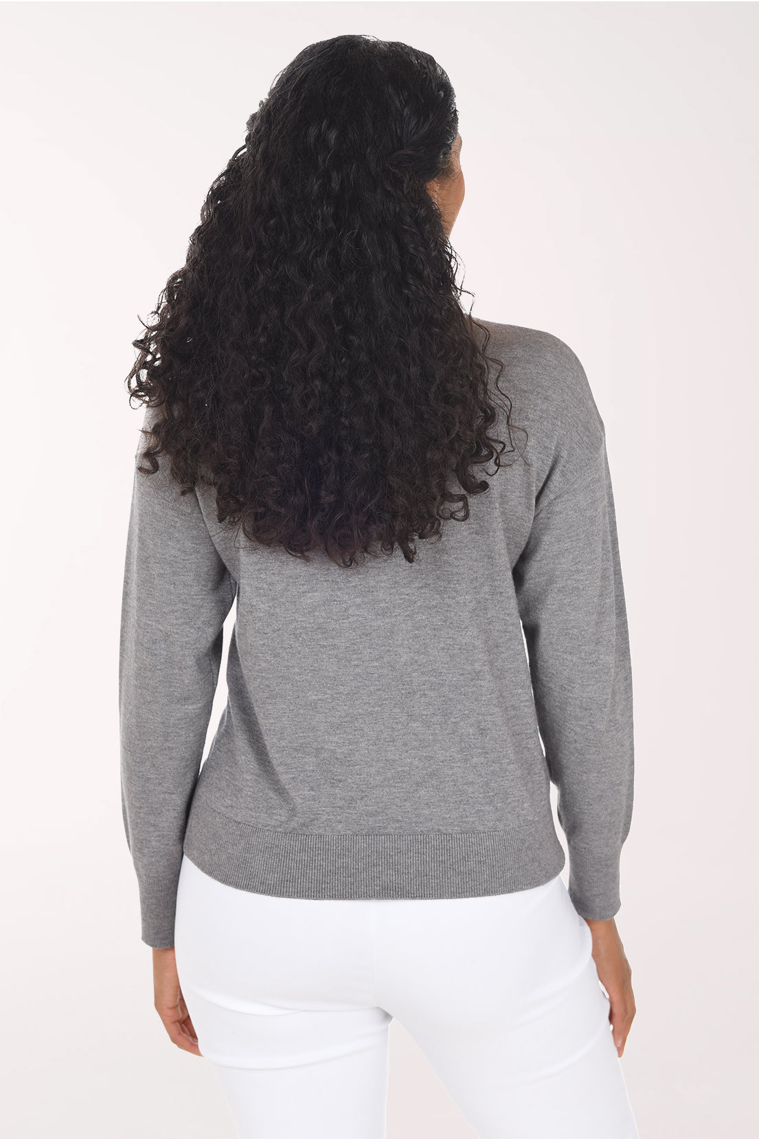 Back view of the plain heather grey sweater with a ribbed hemline.