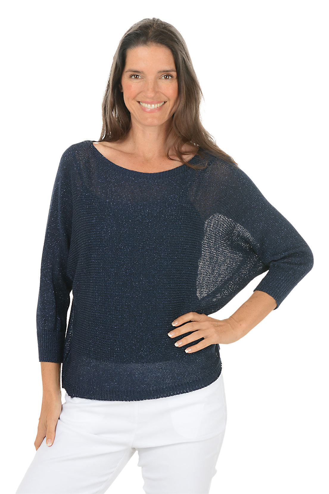 Woman wearing a dark blue sweater with a heart design on a white background