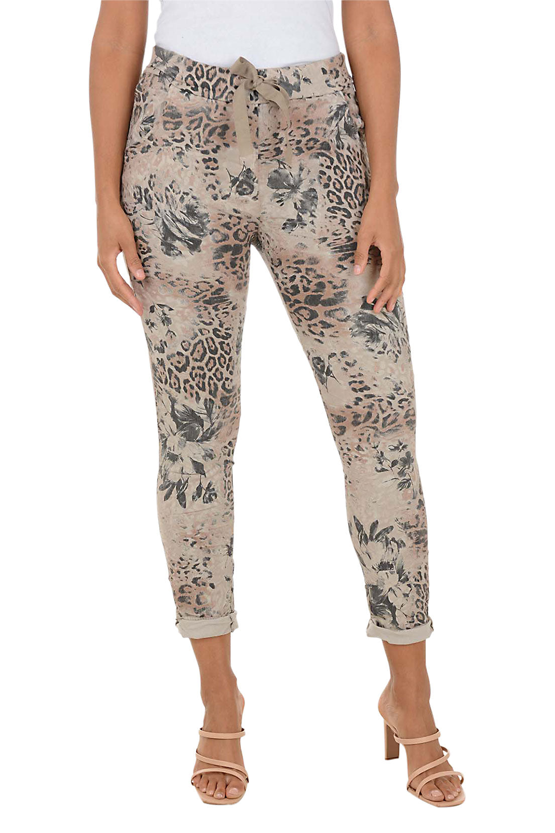 Patterned pants worn by a person on a white background.