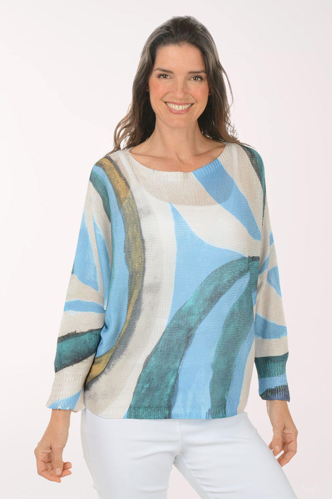 Woman wearing a slouchy blue sweater.