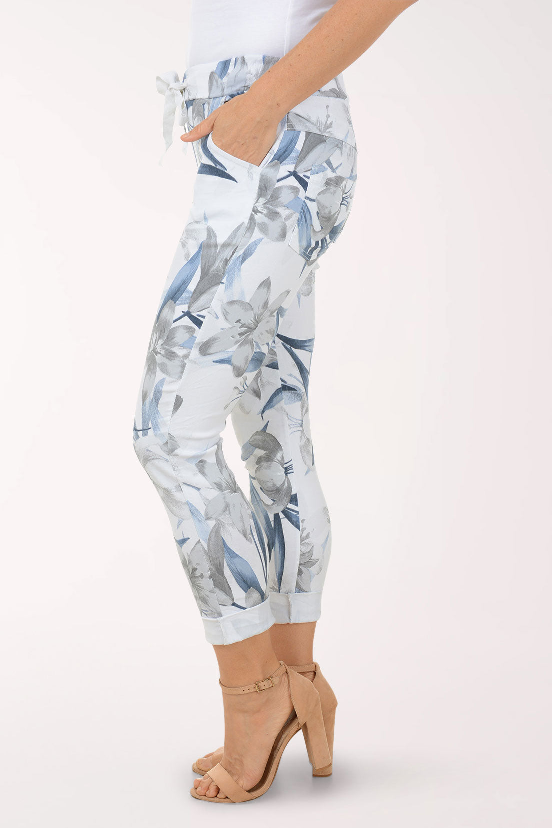 Woman wearing multicolored floral joggers.