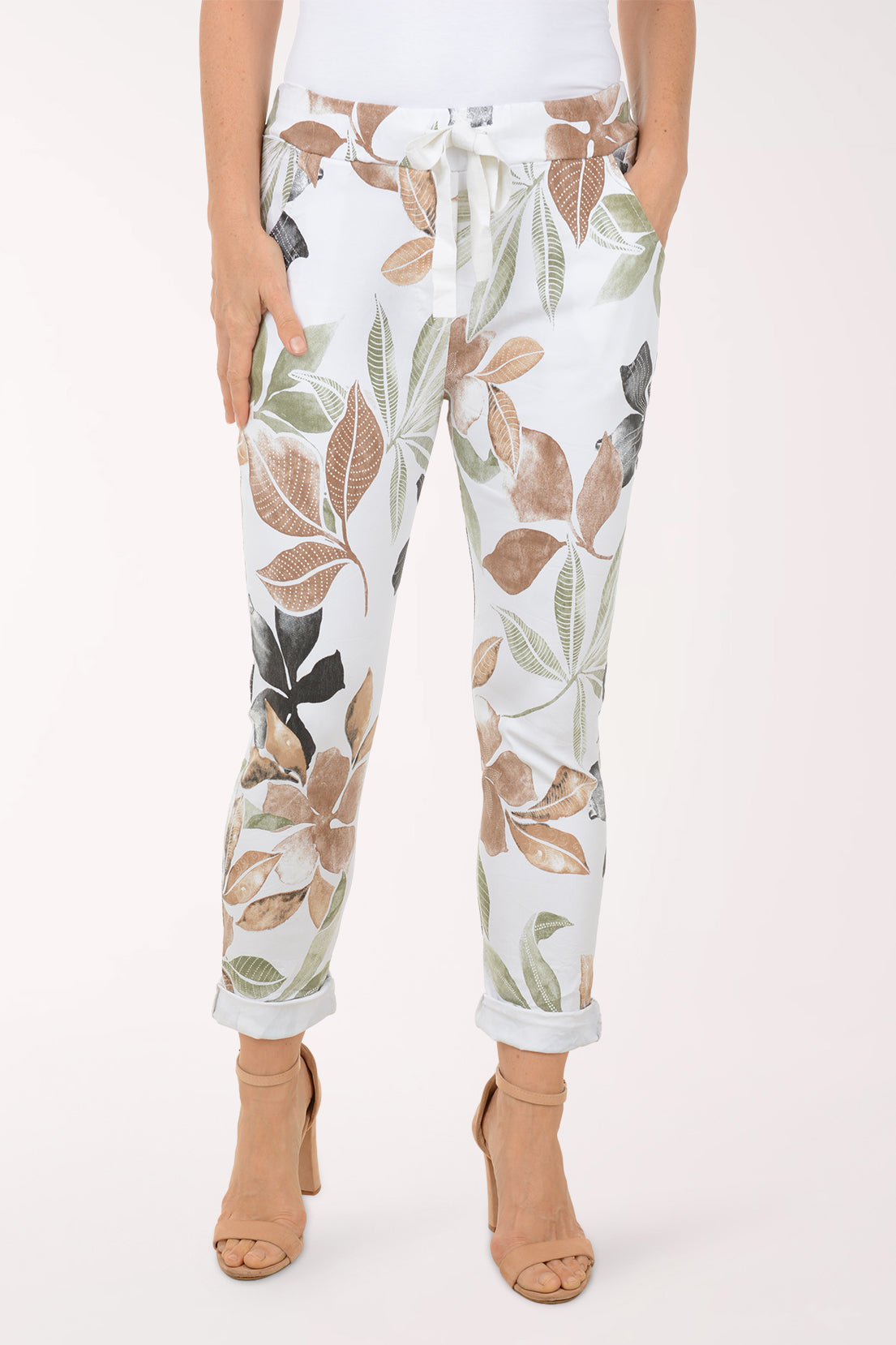 Woman wearing multicolored floral joggers.