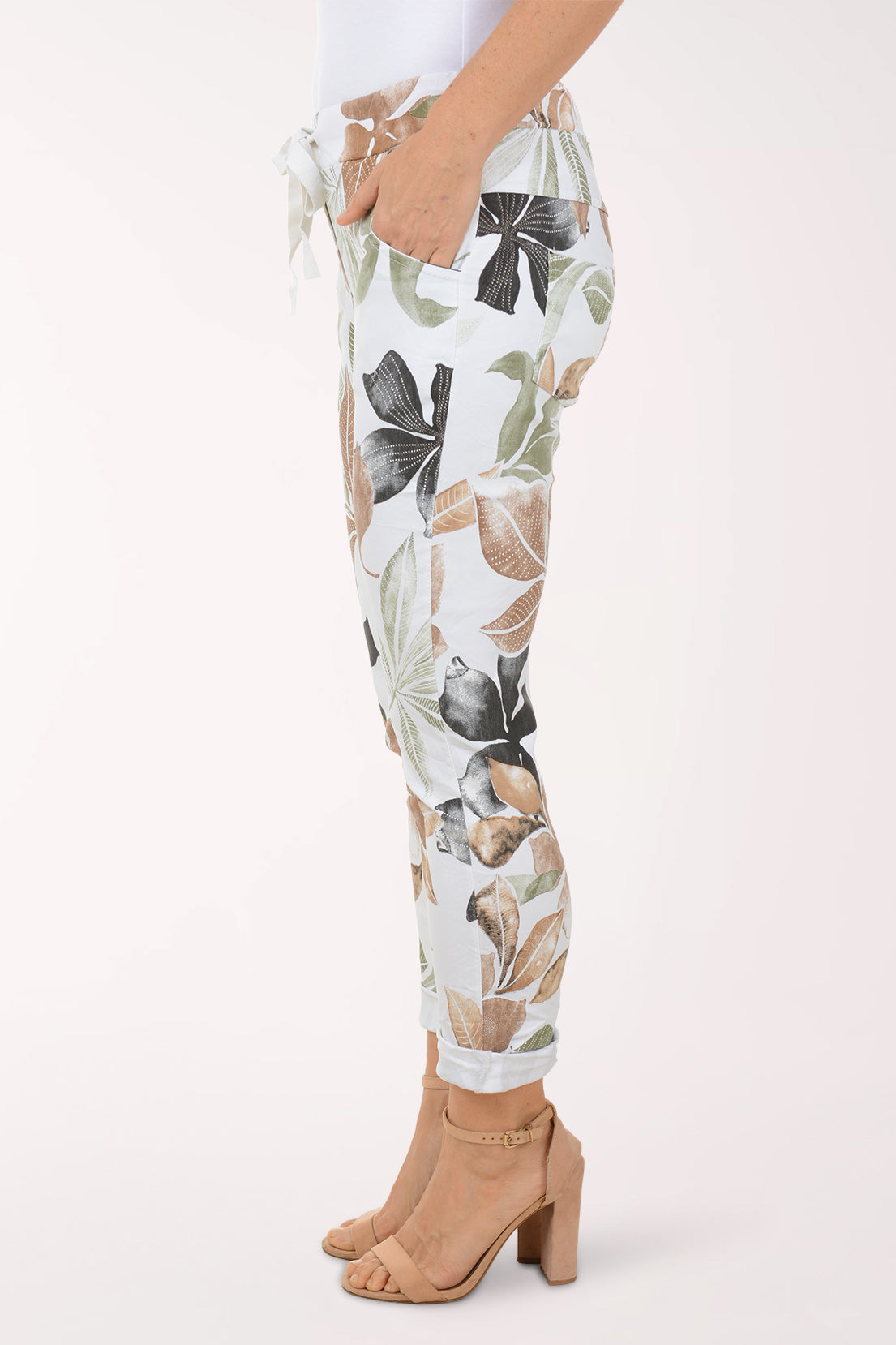 Woman wearing multicolored floral joggers.