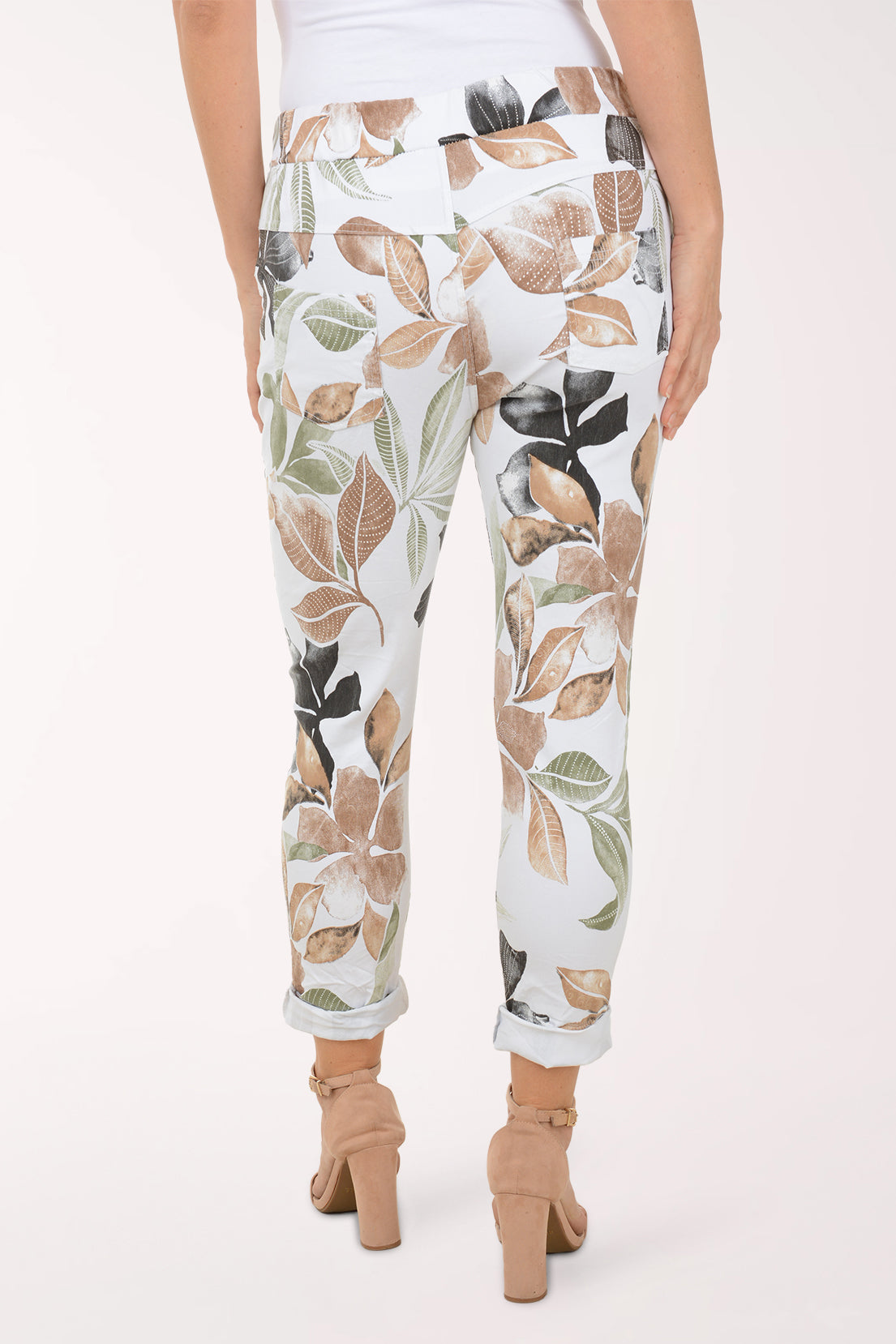 Woman wearing multicolored floral joggers.