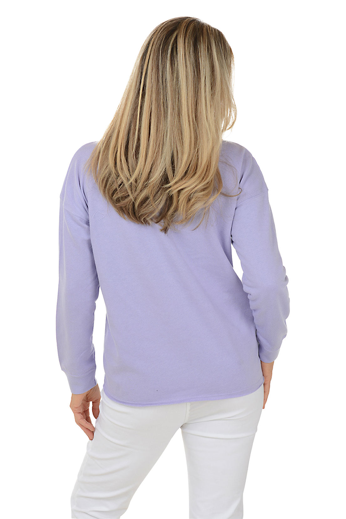 Woman wearing a purple sweater with a white daisy design on a white background. Back shot.