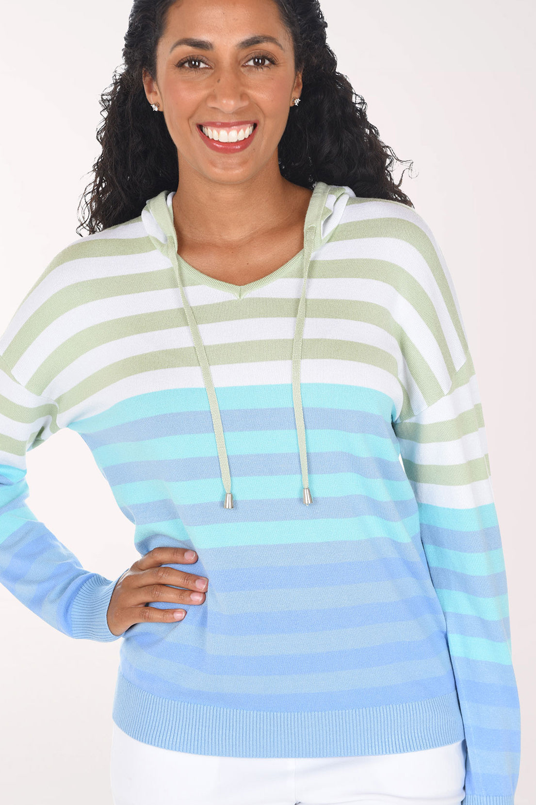 Close-up of the Sky Gradient Striped Hoodie showing the V-neckline, sage drawstrings and the sage, aqua and periwinkle striped knit.