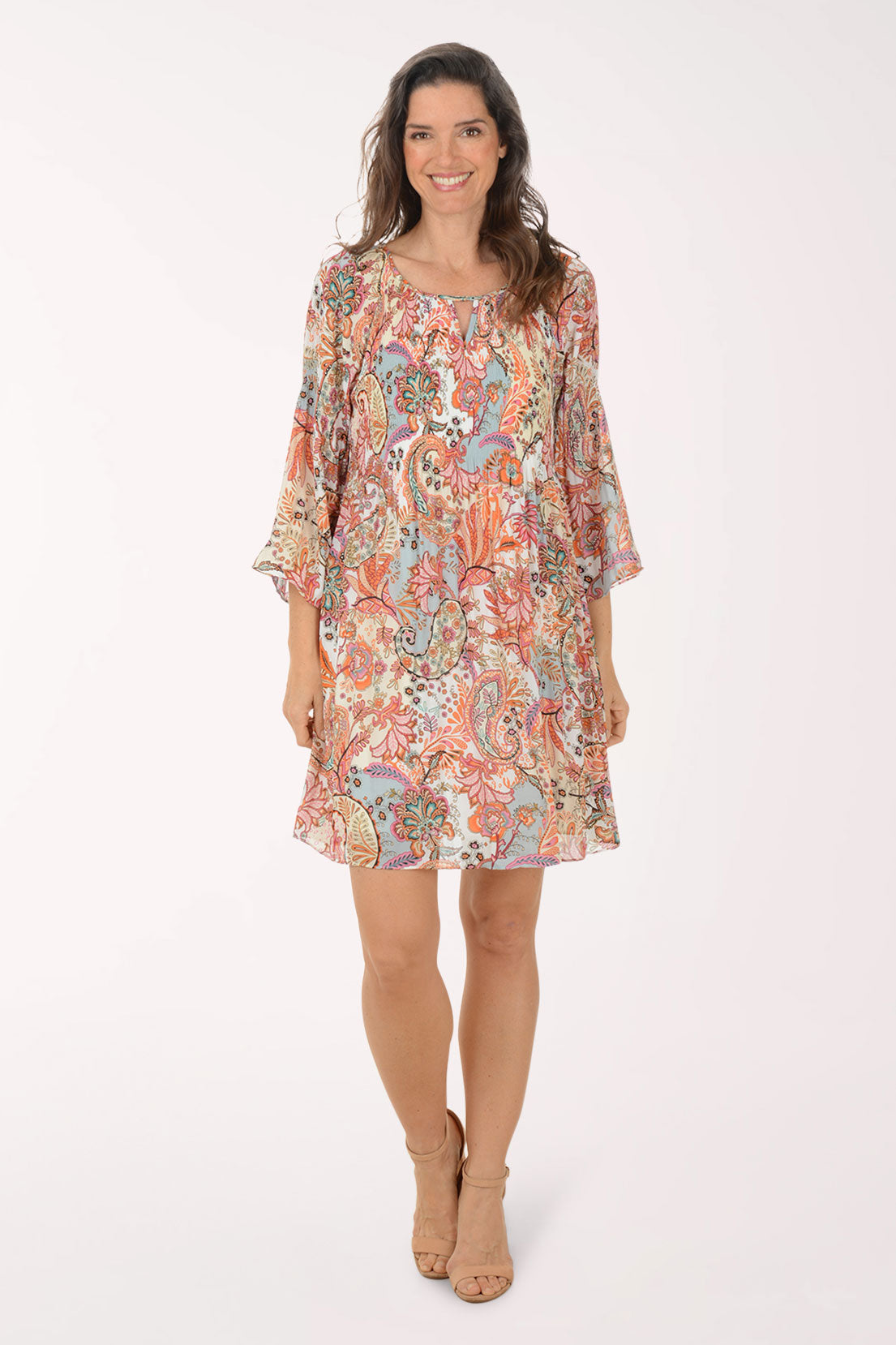 Woman wearing a floral dress on a white background
