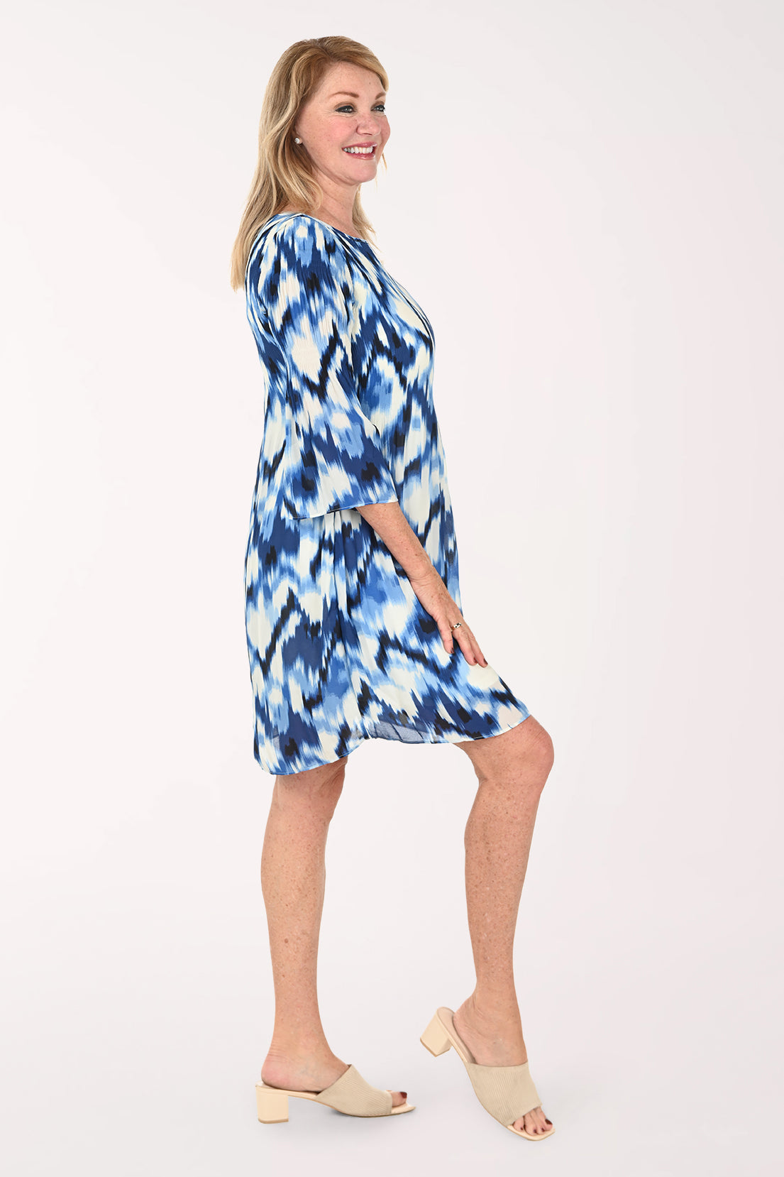 Woman wearing a multi blue dress