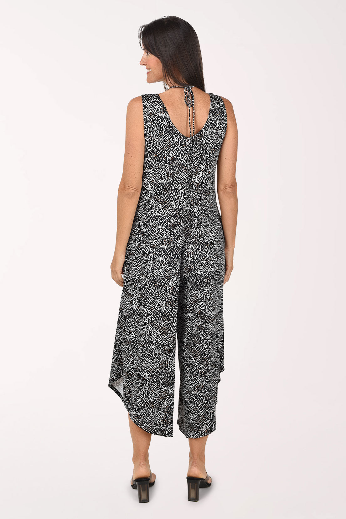 Back view of the Chevron Beaded Neck Jumpsuit showing the beaded tie at the back neck and the wide cropped legs.