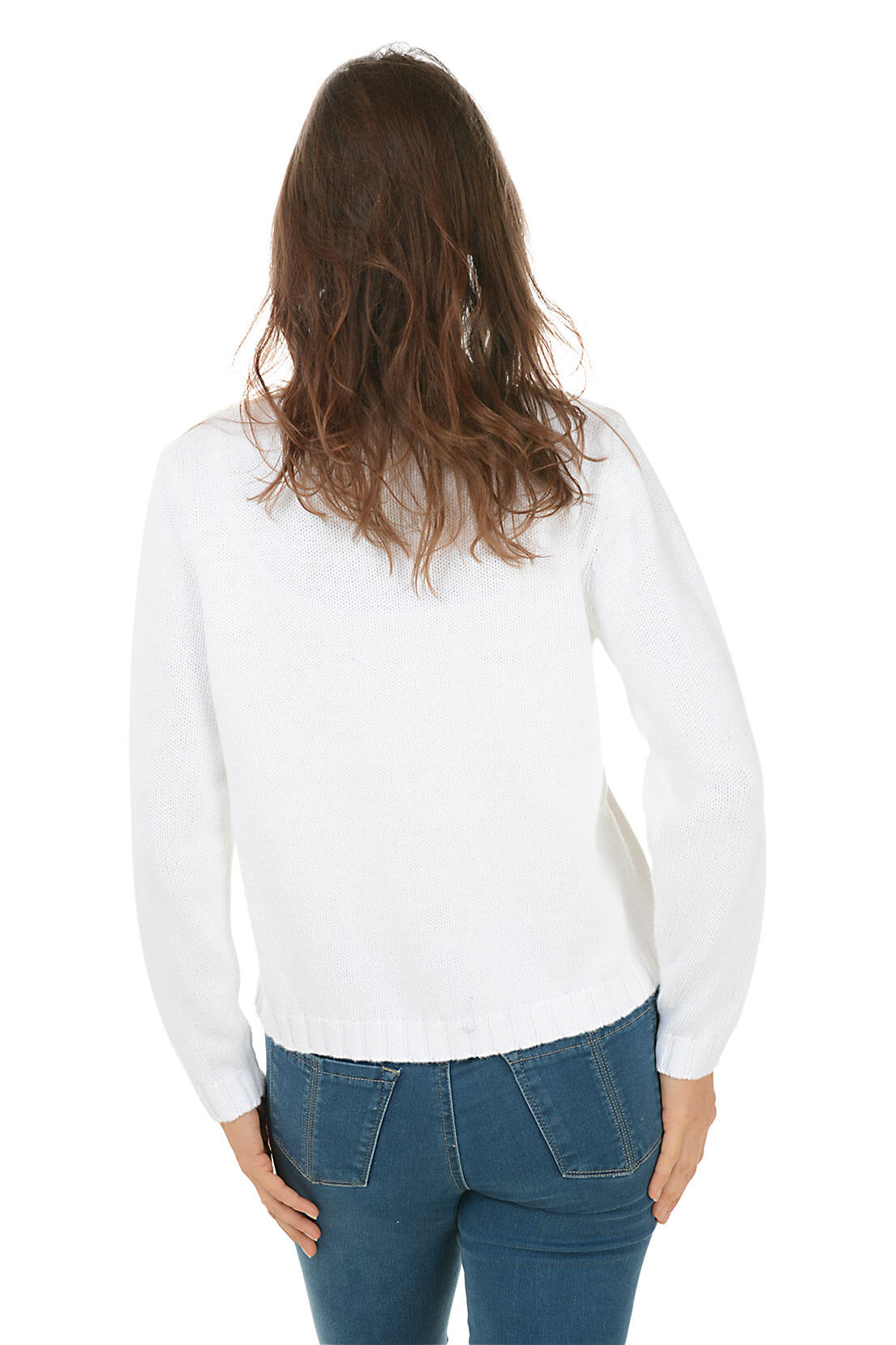 Back shot of a woman wearing a white sweater and blue jeans on a white background