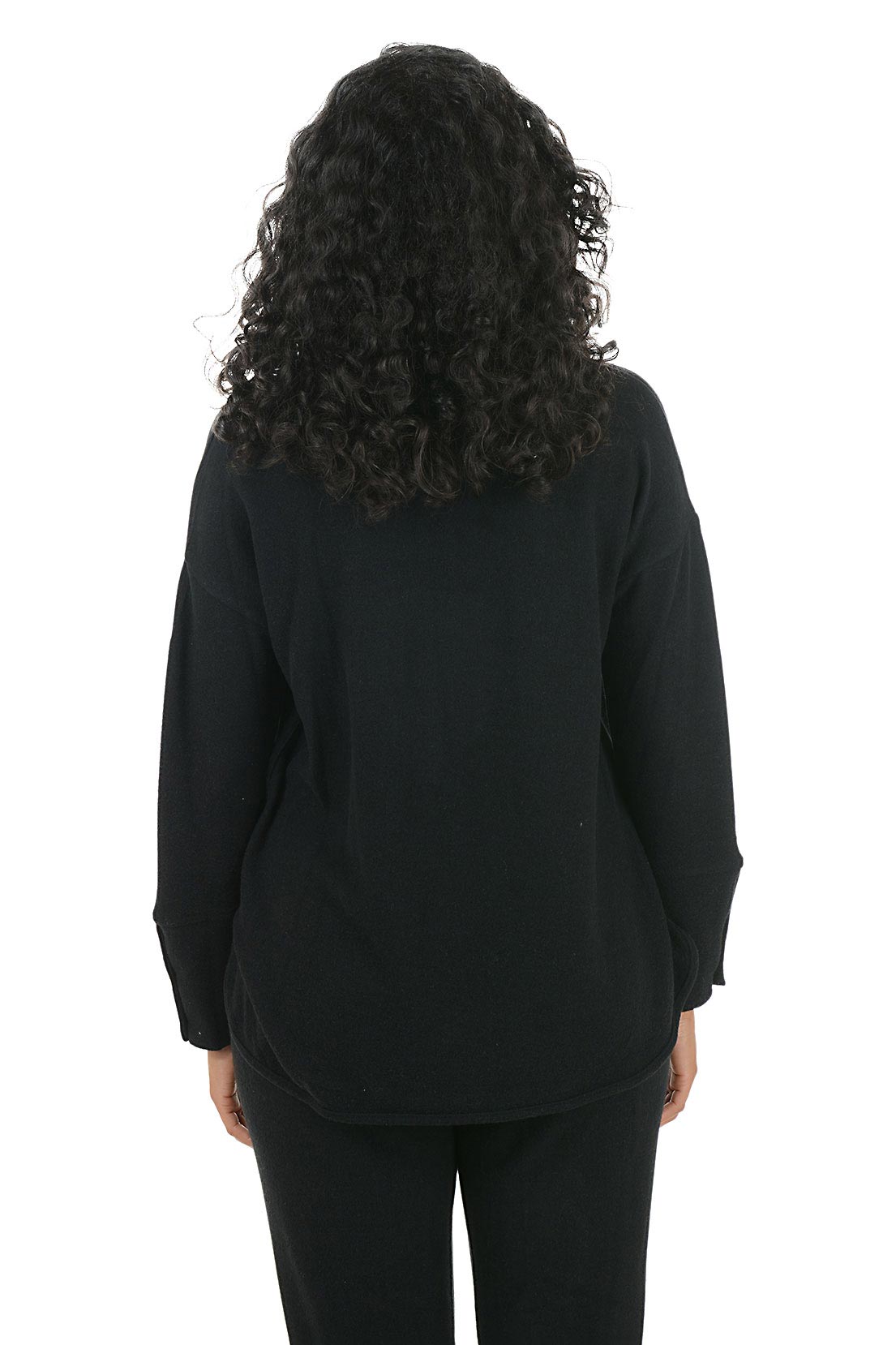 Woman wearing a black hoodie with button details on the arm on a white background. Back shot.