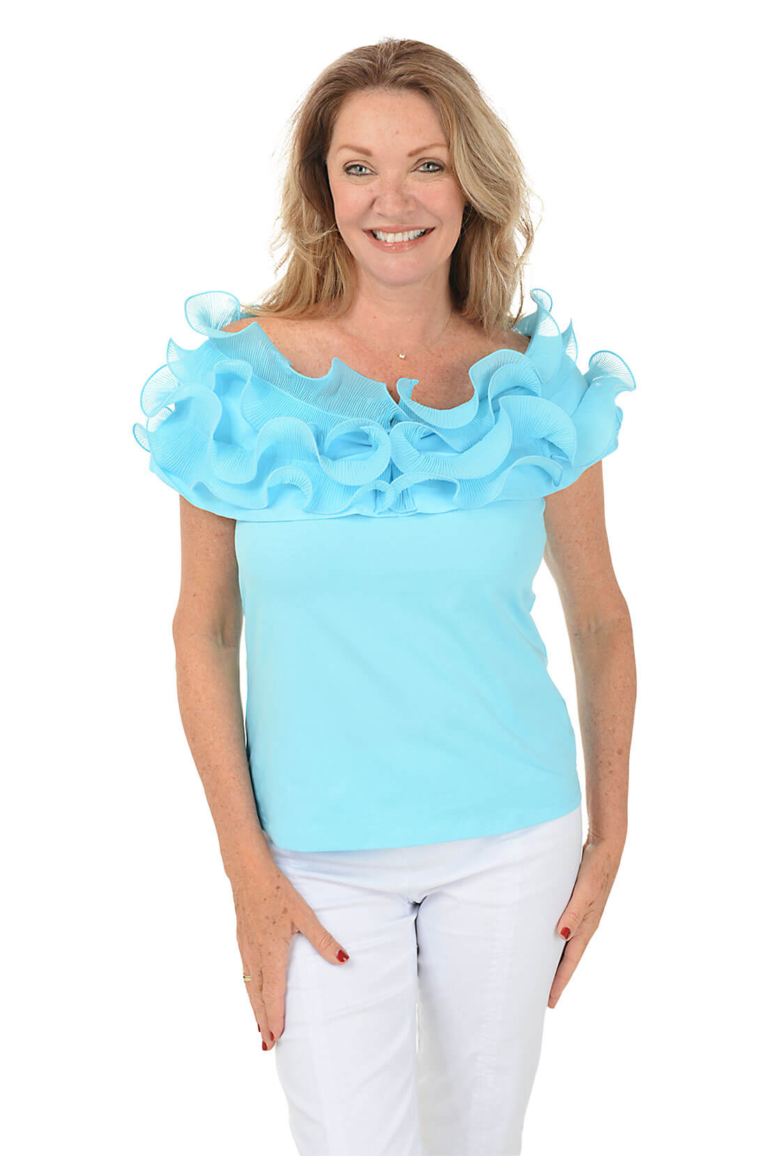 Woman wearing a light blue top with ruffled shoulders on a white background