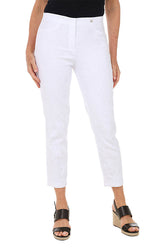 A front shot of a model wearing a pair of white floral jacquard pull-on ankle pants with faux front pockets and back patch pockets, standing against a plain background.