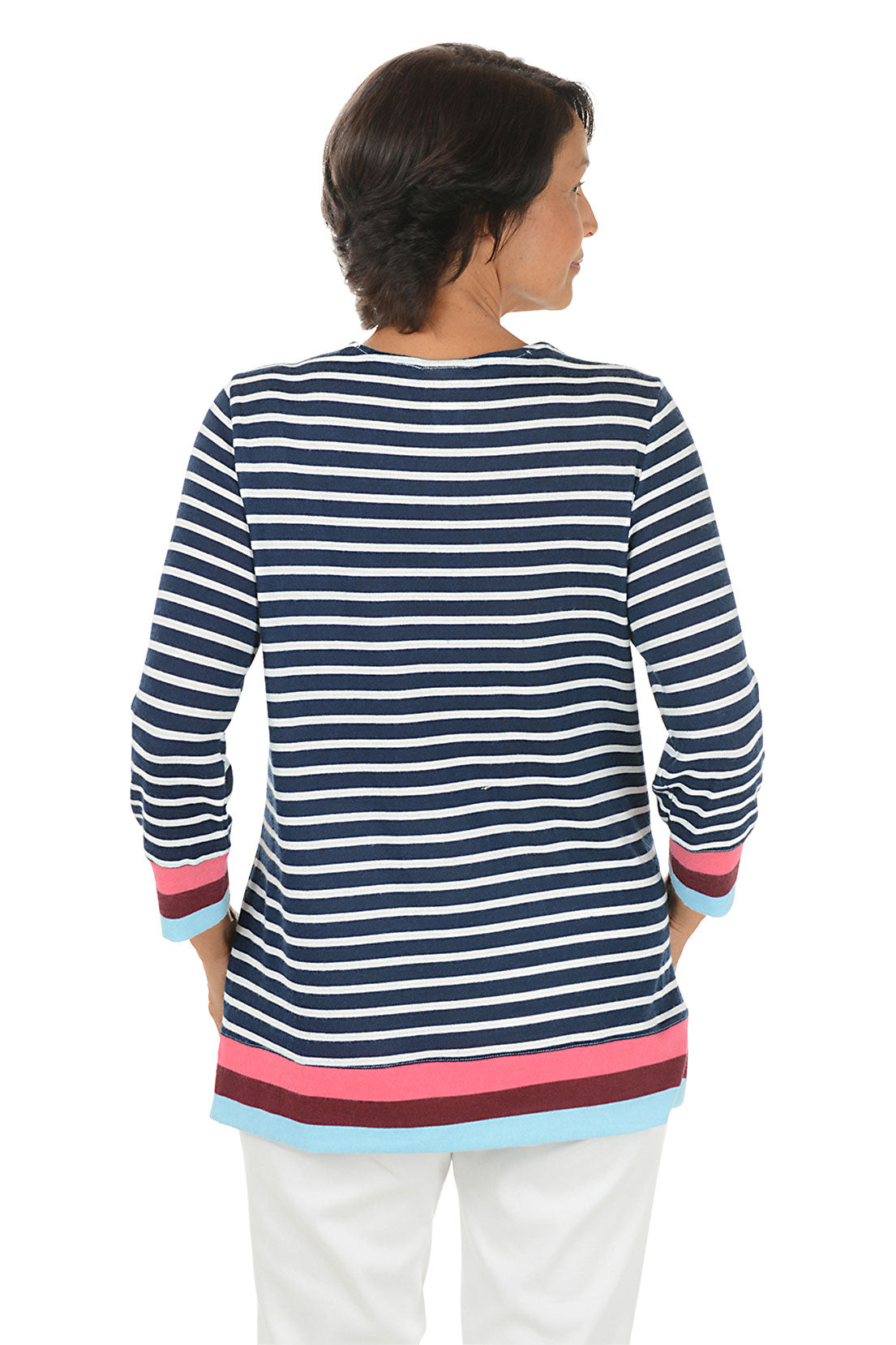 Woman wearing a navy and white striped long-sleeve top with colorful cuffs on a white background. Back shot.