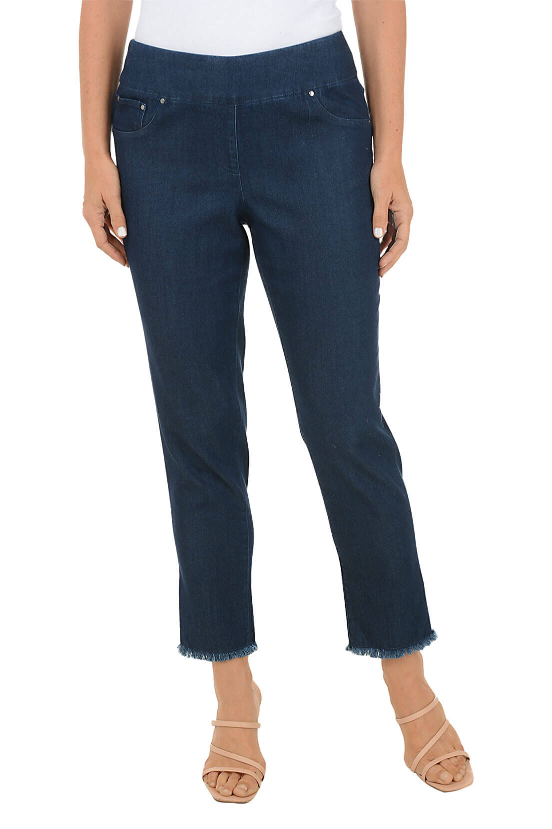 Person wearing dark blue jeans on a white background.