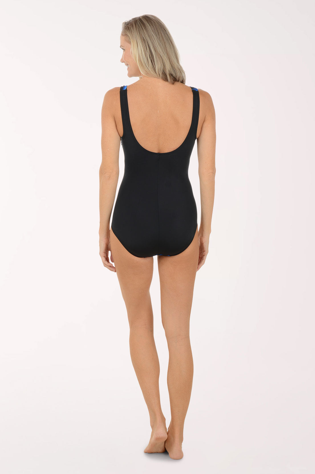 Woman wearing a blue multi one piece swimsuit.