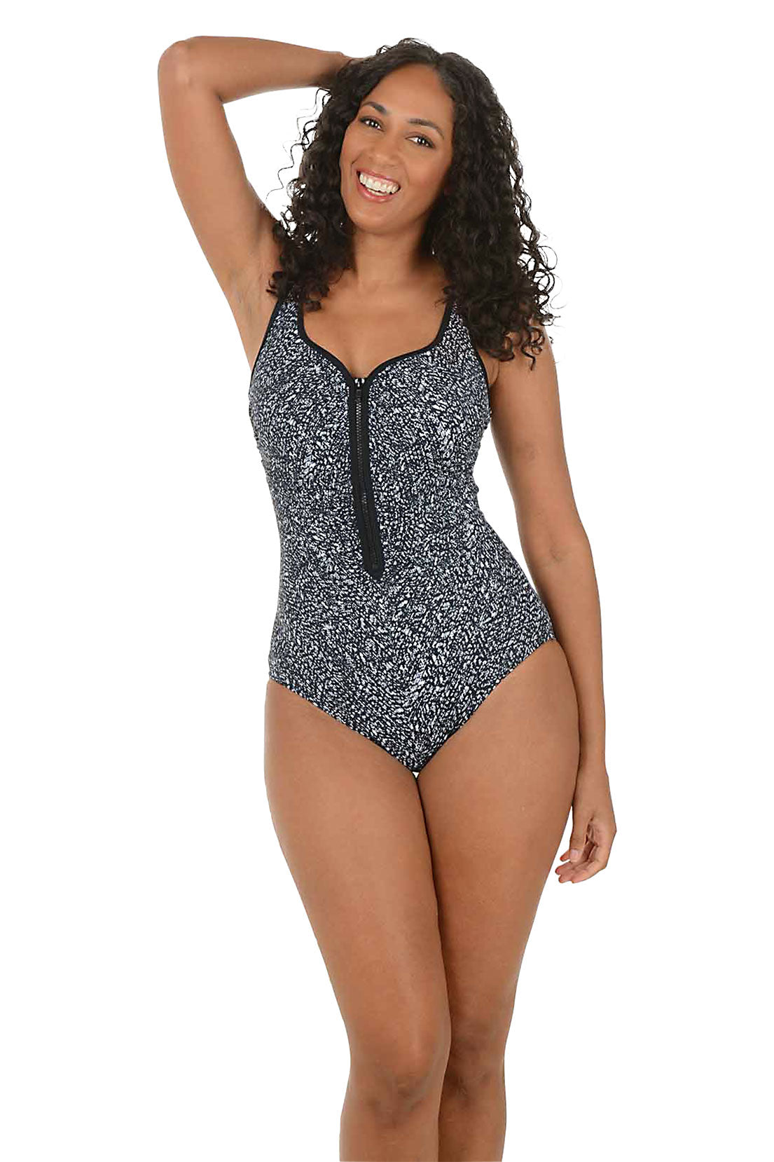 Woman wearing a black and white patterned swimsuit on a white background.