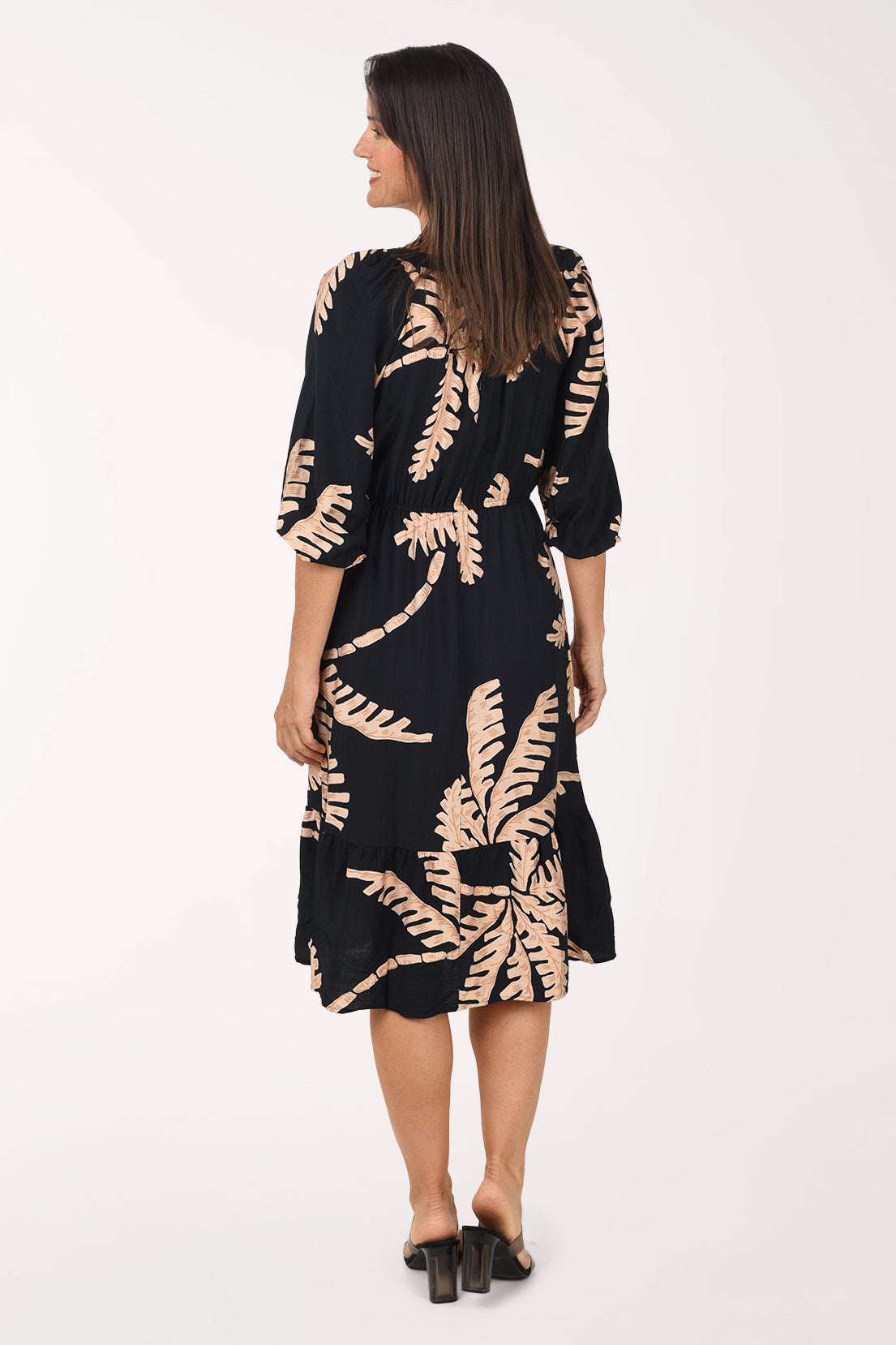 Back view of the Coconut Palm Cinched Waist Midi Dress in black and taupe