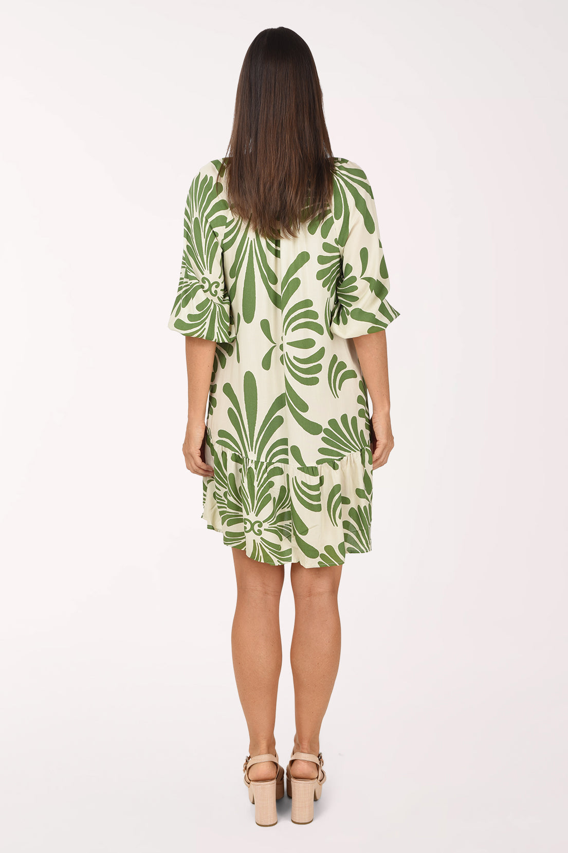 Back view of the La Palma Drop Waist Dress in cream and green