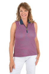 A woman wearing a sleeveless polo top in a pink multi color.