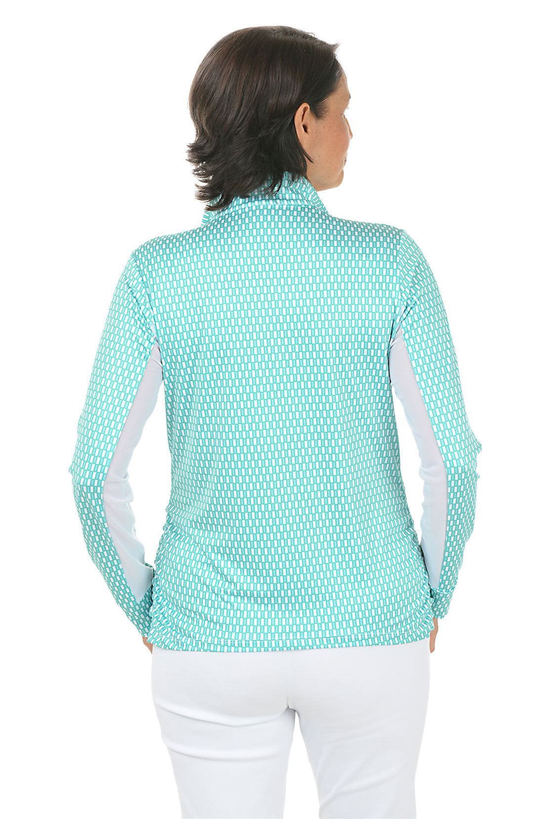 Woman wearing a teal patterned jacket with white accents on a white background. Back shot.